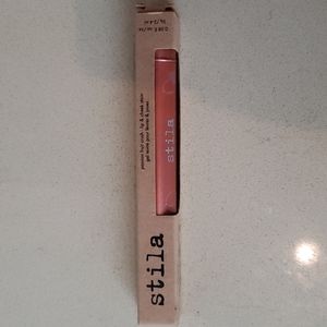 Stila Lip Gloss/Lip and Cheek Stain. Color- Passion Fruit Crush